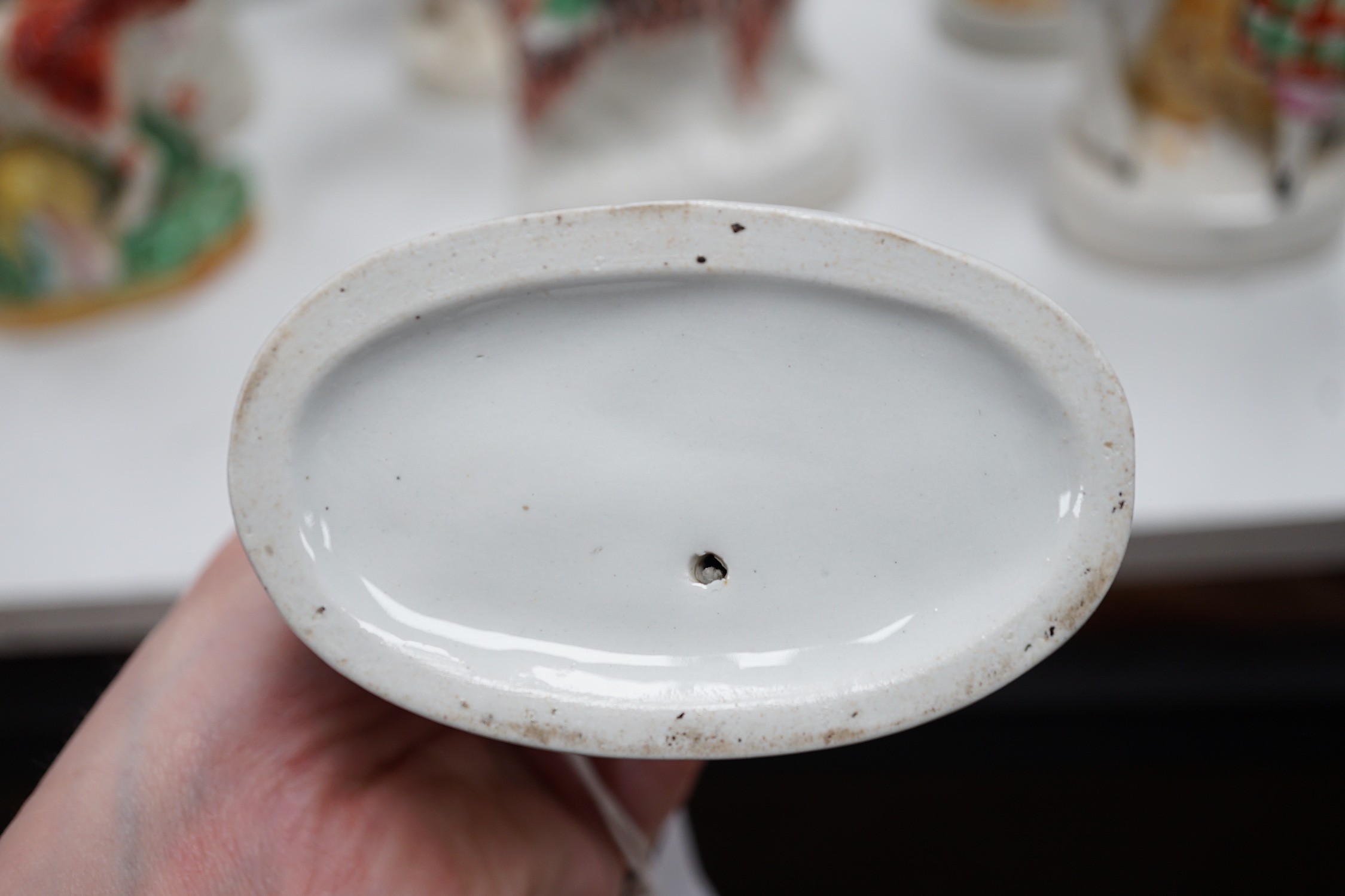 A collection of Victorian Staffordshire pottery flat-back figures and groups, tallest 29cm